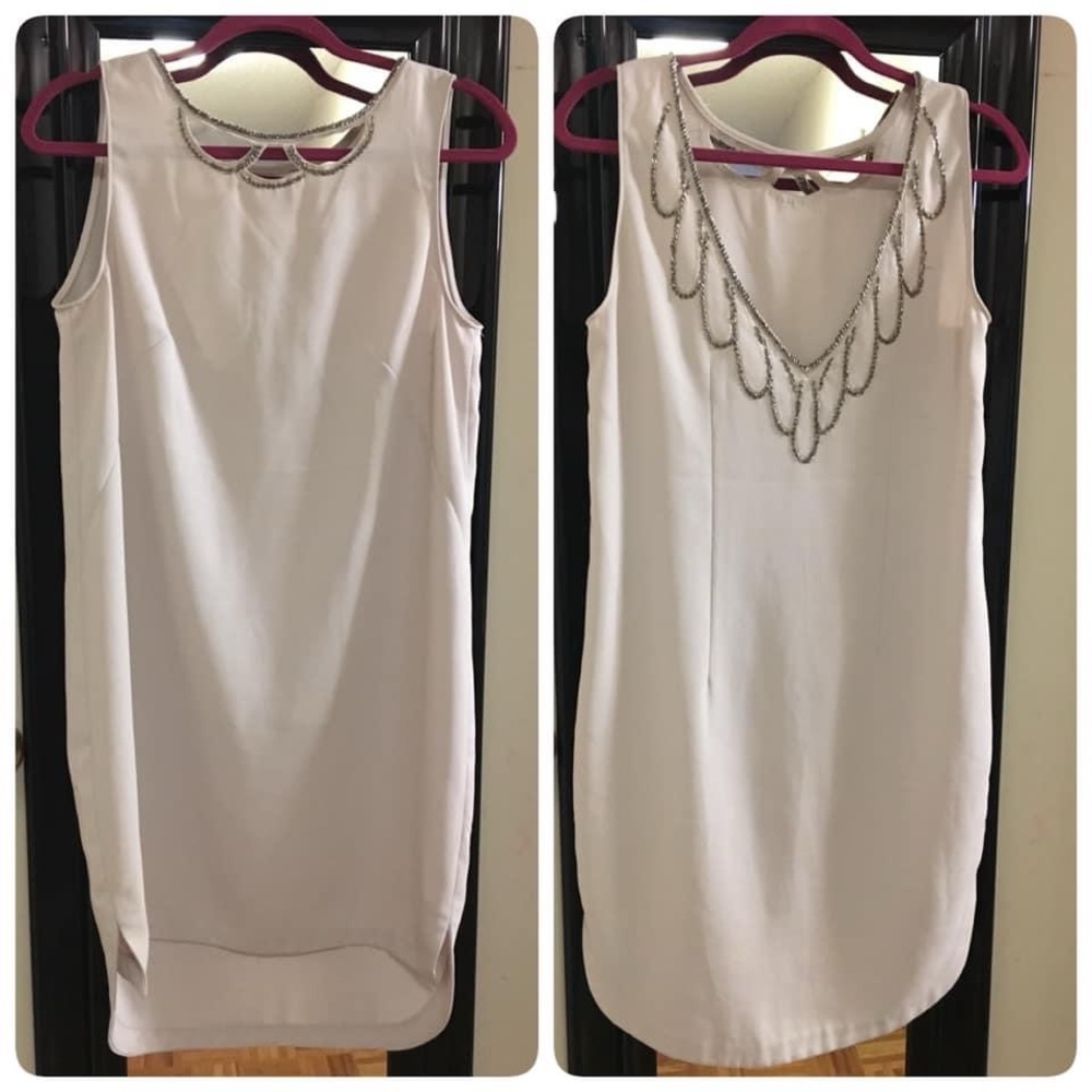 Elegant Cream Sleeveless Dress with Chain Detail